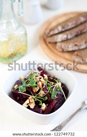Beetroot salad with walnuts and fresh micro-greens
