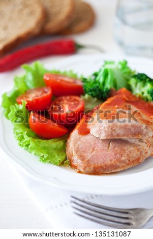 Steamed tuna with red sauce and vegetables