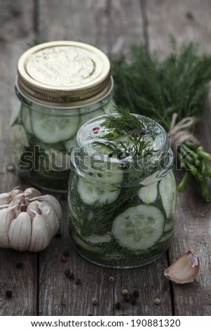 Pickled cucumbers in glass jars