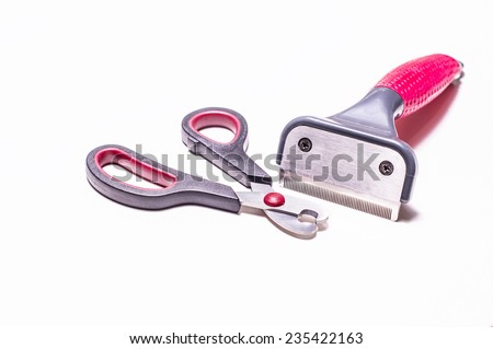 Acessories for the grooming and nail clipper for cats and dogs. Isolated on white background