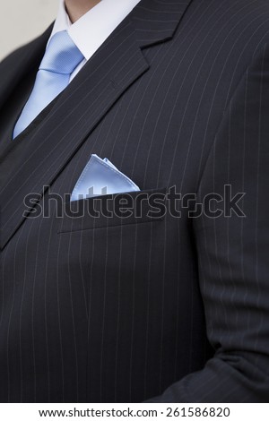 Pin-striped wedding suit with tie and pocket handkerchief