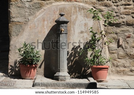 Little fountain in Cortona, a medieval Italian town in Tuscany
