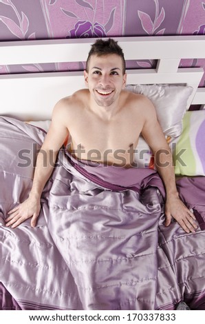 Young man lonely at home bedroom