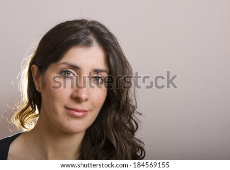 Simple woman portrait looking at the view with copy space