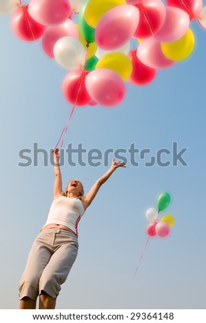 girl fly with balloons