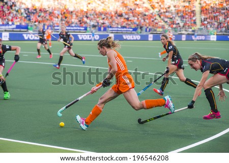 THE HAGUE, NETHERLANDS - JUNE 2: Dutch Hoog is controling the ball with her stick, Belgium player de Groof is trying to take over the ball during the Hockey World Cup 2014 NED beats BEL 4-0