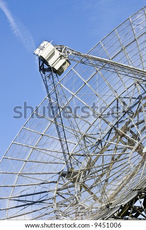 The receiver of a radio telescope dish, searching the skies in a quest for new planetary systems