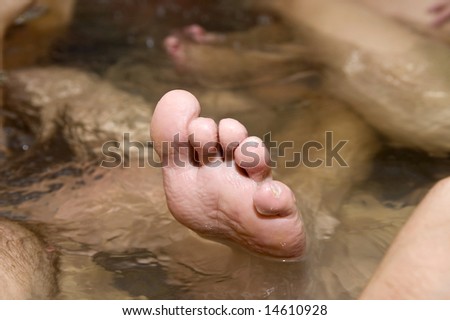 Wrinkled toes in a hot tub