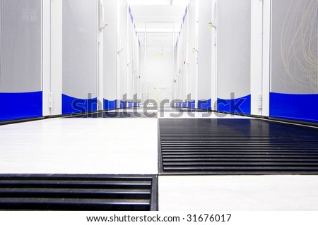 Clean suite in a data center with the perforated doors of server racks