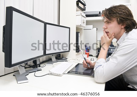 photography studio office. stock photo : A young man at