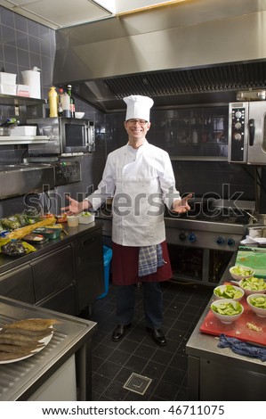 A chef in his kitchen, preparing dinner