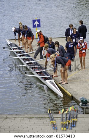 AMSTERDAM-JULY 22:  Canada\'s Women\'s 8 put their boat in the water, preparing for their heat at the world championships under 23. On July 22, 2011 in Bosbaan, Amsterdam, The Netherlands