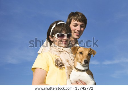 Happy family with a pet