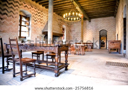 interior of the refectory hall with a fireplace in castle, medieval architecture