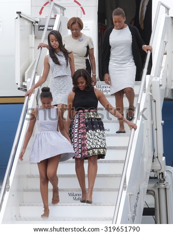 MILAN MALPENSA - JUNE 16, 2015: The first lady Michelle Obama lands in Milan to visit Expo 2015, with daughters Malia and Sasha, and her mother Marian Robinson.