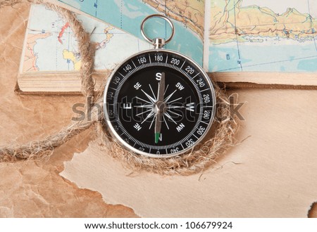 compass and a map of the rope on a light background