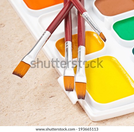 watercolor paints and brushes for painting
