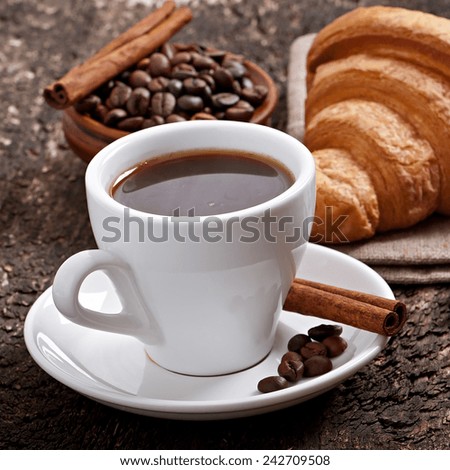 cup with coffee, breakfast coffee, a cup of coffee on old wooden table