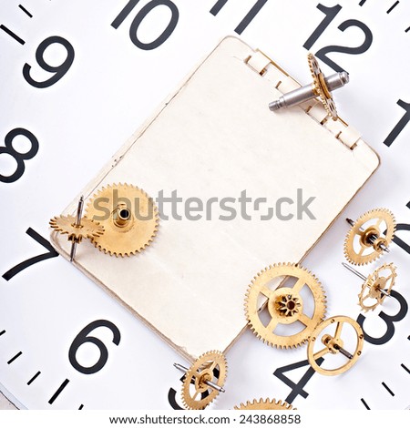 old technology background, paper and old mechanical clock gear