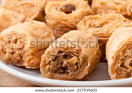 Eastern dessert baklawa with pistachio nuts, dessert sweets assorted