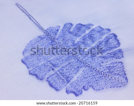 A blue background with leaf pattern