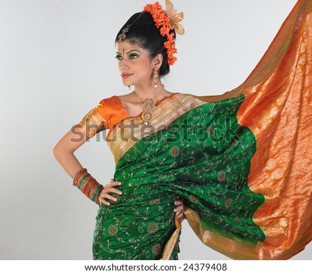 Woman in silk-sari showing her rich border of the sari