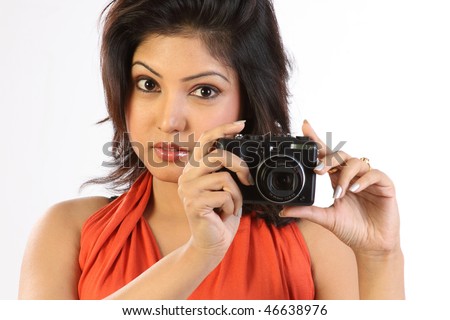 stock photo Young chubby woman with camera