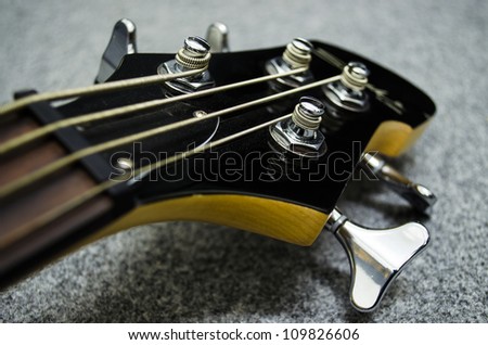 close up of bass head with tuner