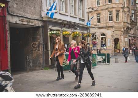 EDINBURGH, SCOTLAND / UNITED KINGDOM - MAY 24 2015 - Unidentified group of women, walking and laughing on the streets of Edinburgh.