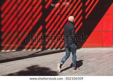 Young man walking on the city