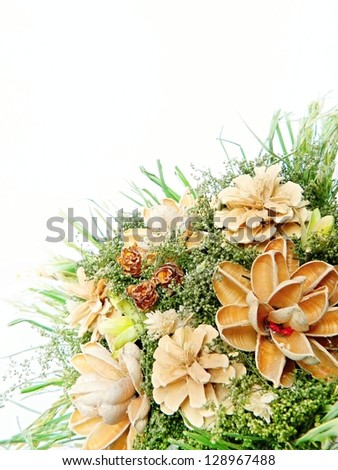 Decorative bouquet of dried flowers on white background