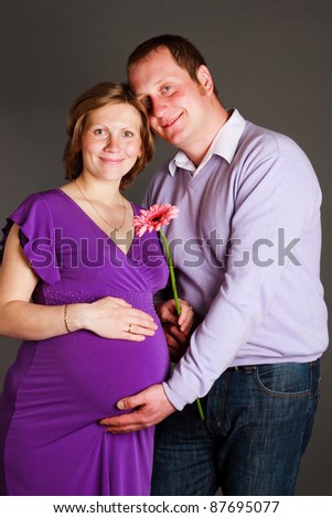 Happy family expecting their child