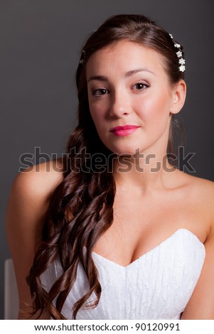 Closeup portrait of beautiful dark haired bride