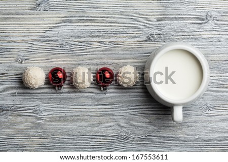 milk on a wooden table in candy