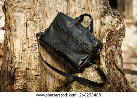 Leather bag on a background of nature