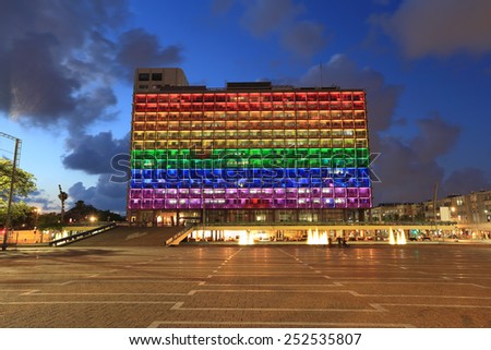 Rainbow flag lighting over Tel Aviv city hall building for pride month