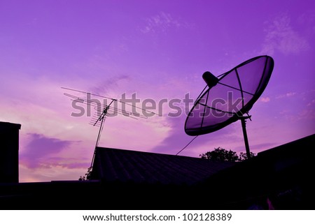 silhouette Satellite Dish and Antenna TV on Sunset Time