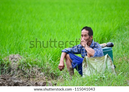 old asian man in farm of thailand southeast asia