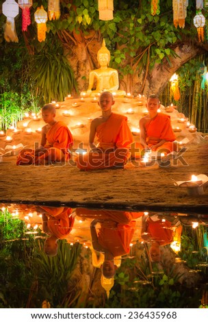 CHIANG MAI, THAILAND - NOV 08 : Buddhist monks meditation front side Buddha in Loy Kratong Festival, Wat Pan Tao Temple, Chiangmai, Thailand 2014