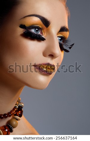 Model with fancy makeup.