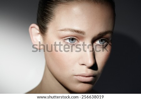 Tanned makeup on a caucasian model.