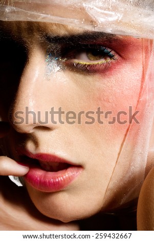 Closeup of wet female face.