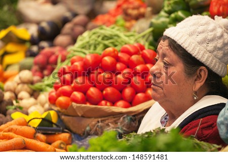 POTOSI, BOLIVIA - JAN 14: Seller vegetables at the market in Bolivia, January 14, 2010. Agriculture is the primary source of livelihood in Bolivia.