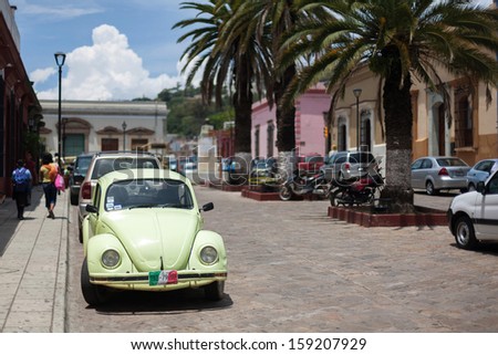 OAXACA, MEXICO - SEN 08: Old cars on the street of Oaxaca, Mexico, 08 September 2012. The city architecture of Oaxaca is protected by UNESCO