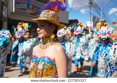CUZCO, PERU - SEPTEMBER 8: The unknown Peruvian people participating in a religious holiday in Cuzco, Peru, 8 Septiembre 2014. Every year in Cuzco passes many religious holidays and carnivals