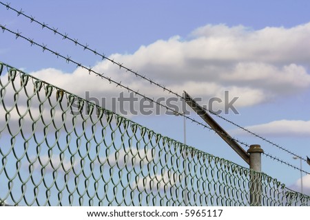 barbed wire fence as a security system