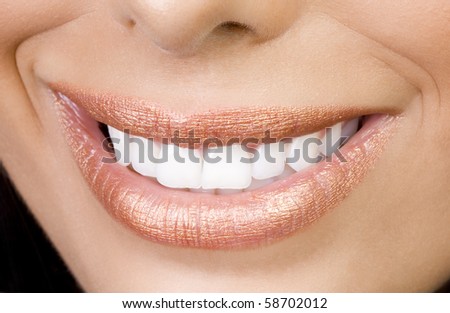 sexy feminine smiling mouth with perfect teetch and sensual lips