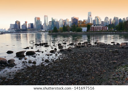 Vancouver skyline at sunset as seen from Stanley Park, British Columbia, Canada
