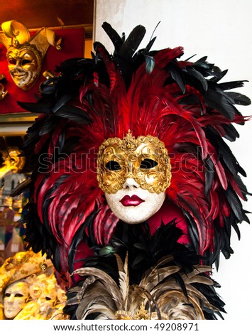 Red, black and golden Venetian mask