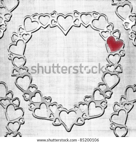 Metal hearts on abstract background